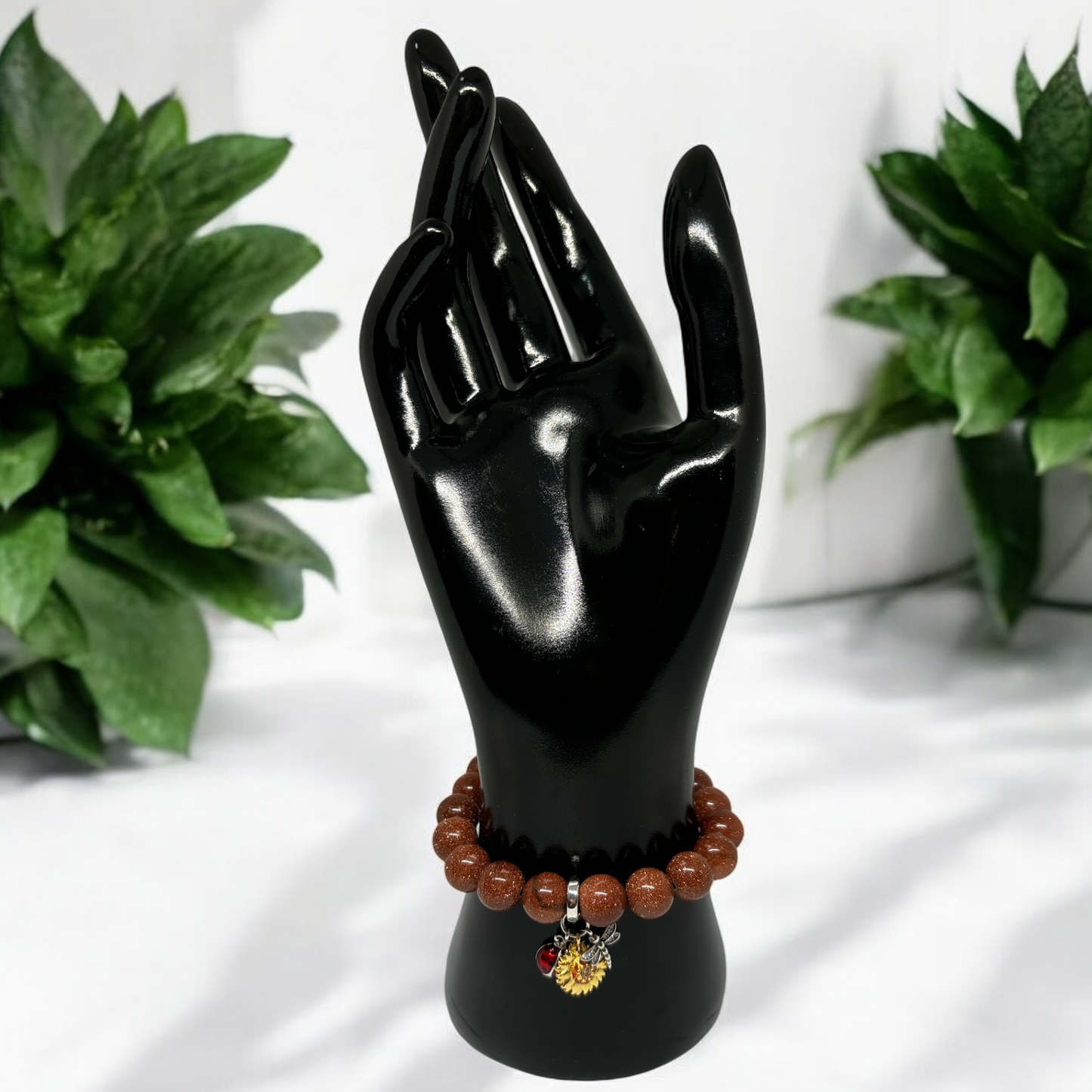 Gold Sandstone Bracelet adorned with a Silver-plated charm featuring an Enamel Sunflower, Dragonfly, and Ladybug