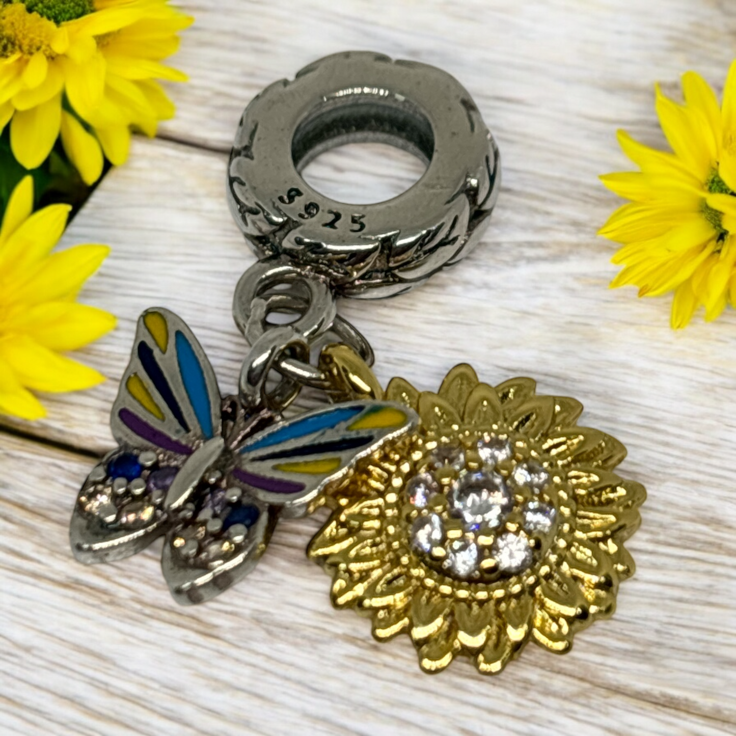 Sunflower and butterfly charm