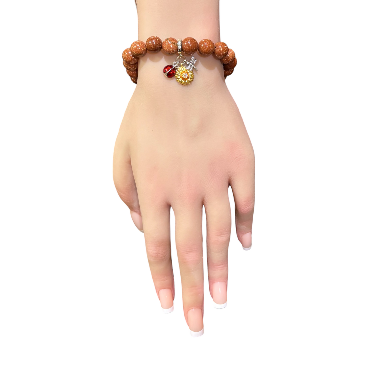 old Sandstone Bracelet adorned with a Silver-plated charm featuring an Enamel Sunflower, Dragonfly, and Ladybug