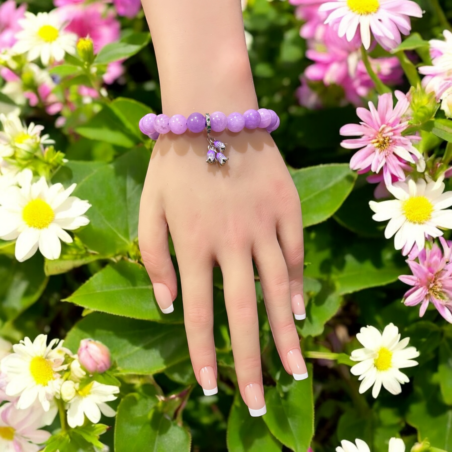 Lavender Amethyst Bracelet and silver-plated charm adorned with purple enamel flowers.