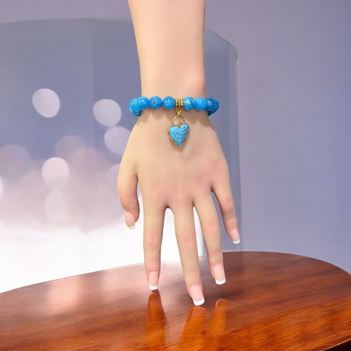 Apatite Bracelet with a natural Turquoise Stone Heart charm.