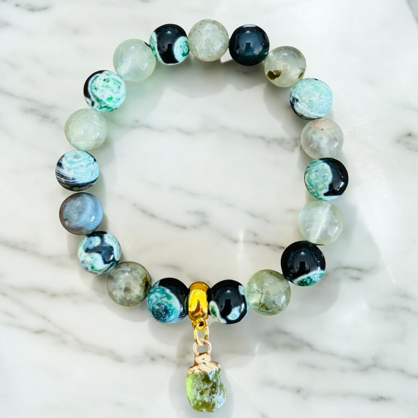 Green Dream Fire Agate and Prehnite Stone & Raw Peridot charm set with a brass finding.