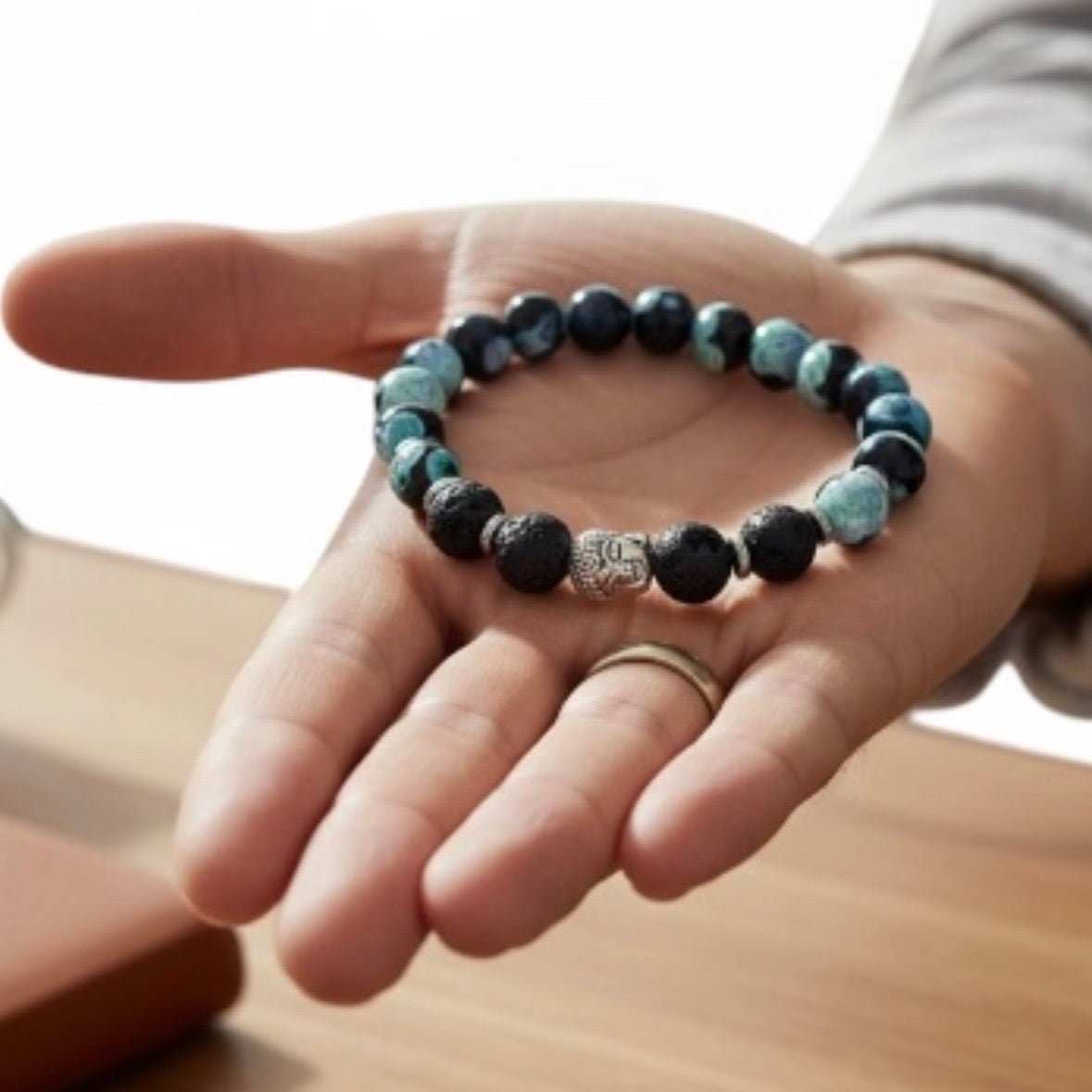 Handcrafted green dream agate and lava rock bracelet for balance, growth, and emotional resilience