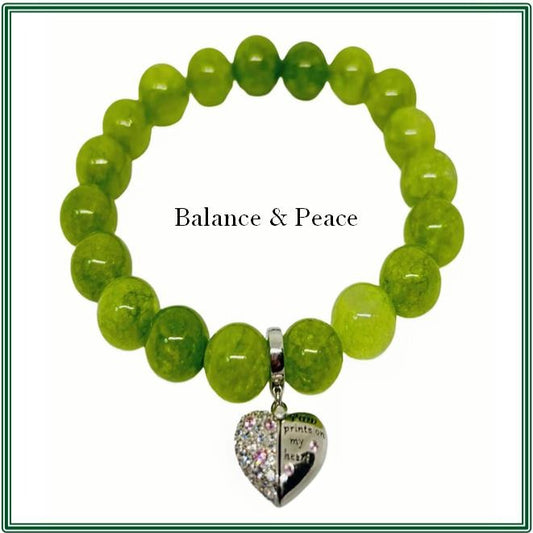 Peridot Stone Bracelet with silver-plated charm.