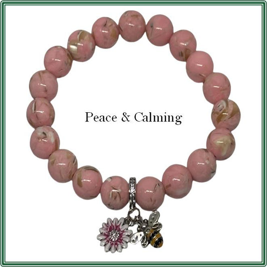 Pink Shell Howlite bracelet combined with a sterling silver pink daisy flower and bee charm
