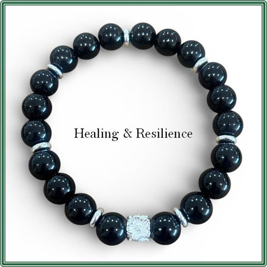 Black Onyx Bracelet with Stirling Silver Fower Charm